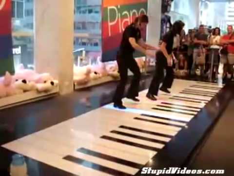 Girls Play A Big Piano