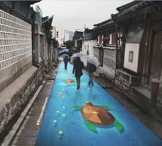 Strassenkunst, die nur bei Regen zum Vorschein kommt