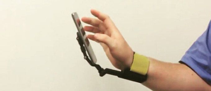 TUSK: wristband with smartphone holder