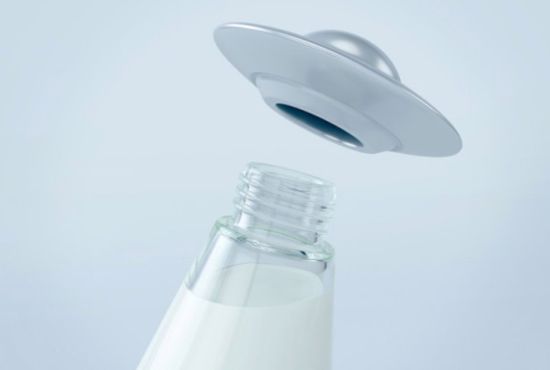 Milk packaging beams cow in UFO