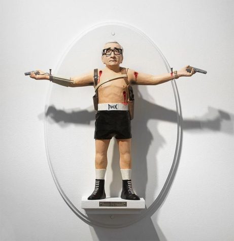 Die Köpfe von Regisseuren auf Körpern von Figuren