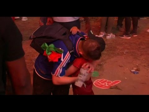 EM 2016: What football is really about: Little Portugal fan comforts the big French