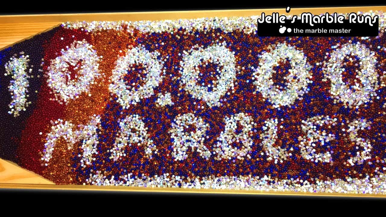 100 mini marbles on a track