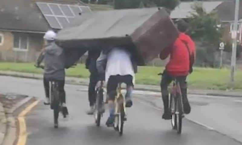 Squad of Cyclists Carry a Couch || ViralHog